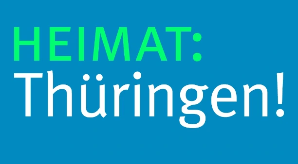 Blaues Logo HEIMAT:Thüringen! mit grüner und weißer Schrift